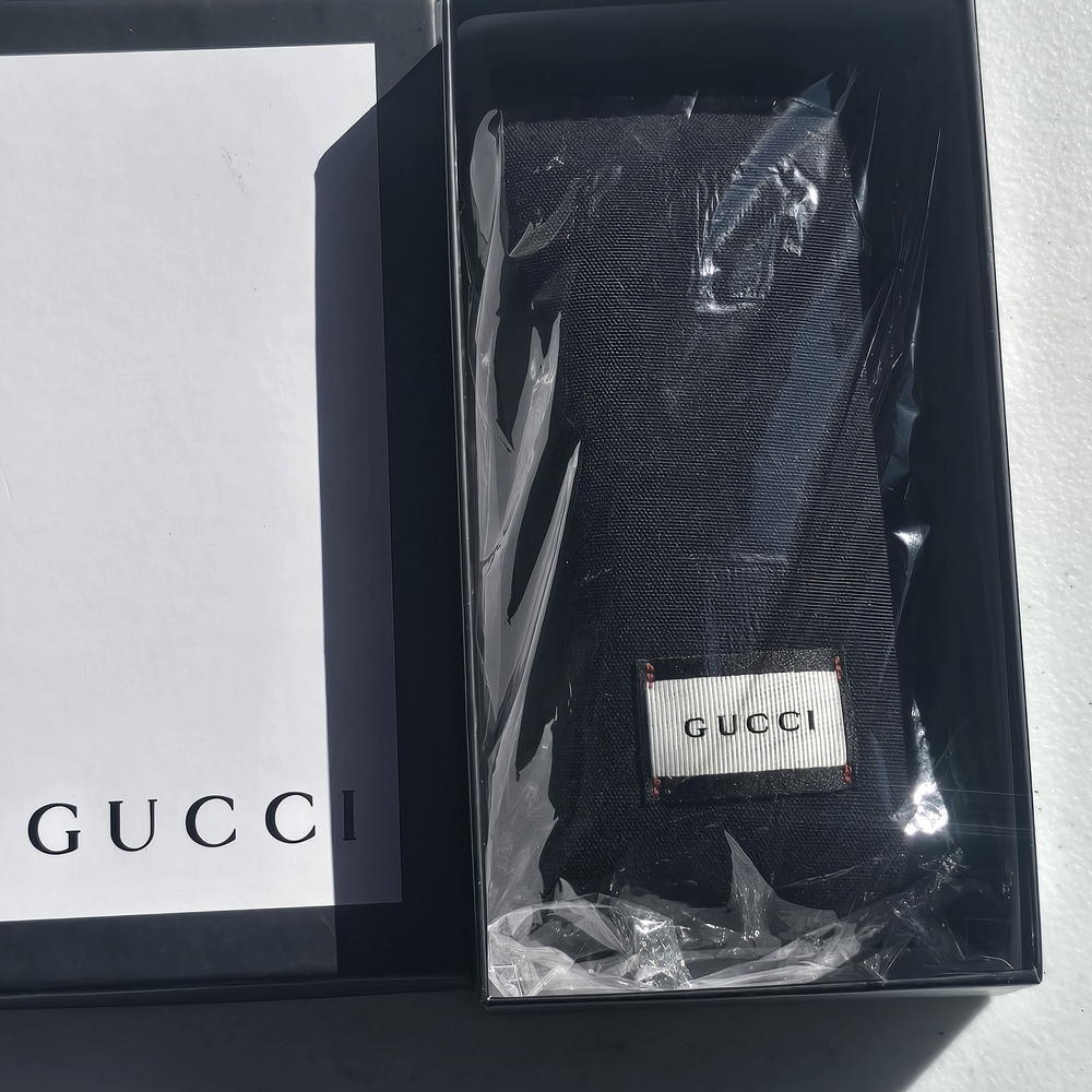 Gucci Black Frame Sunglasses with Purple Tint - Picture 4 of 6